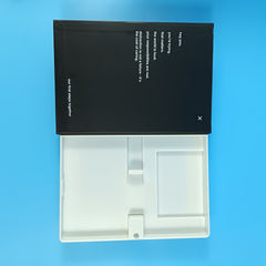 Book Decoy open, showing the white molded tray inside with phone and card slots
